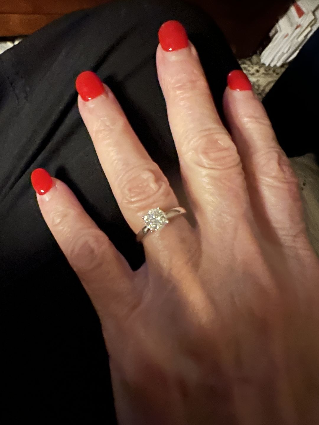 Customer photo review of Classic Solitaire Round Moissanite Four Prong Engagement Ring