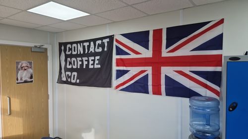 Customer photo review of Contact Coffee Co. Banner