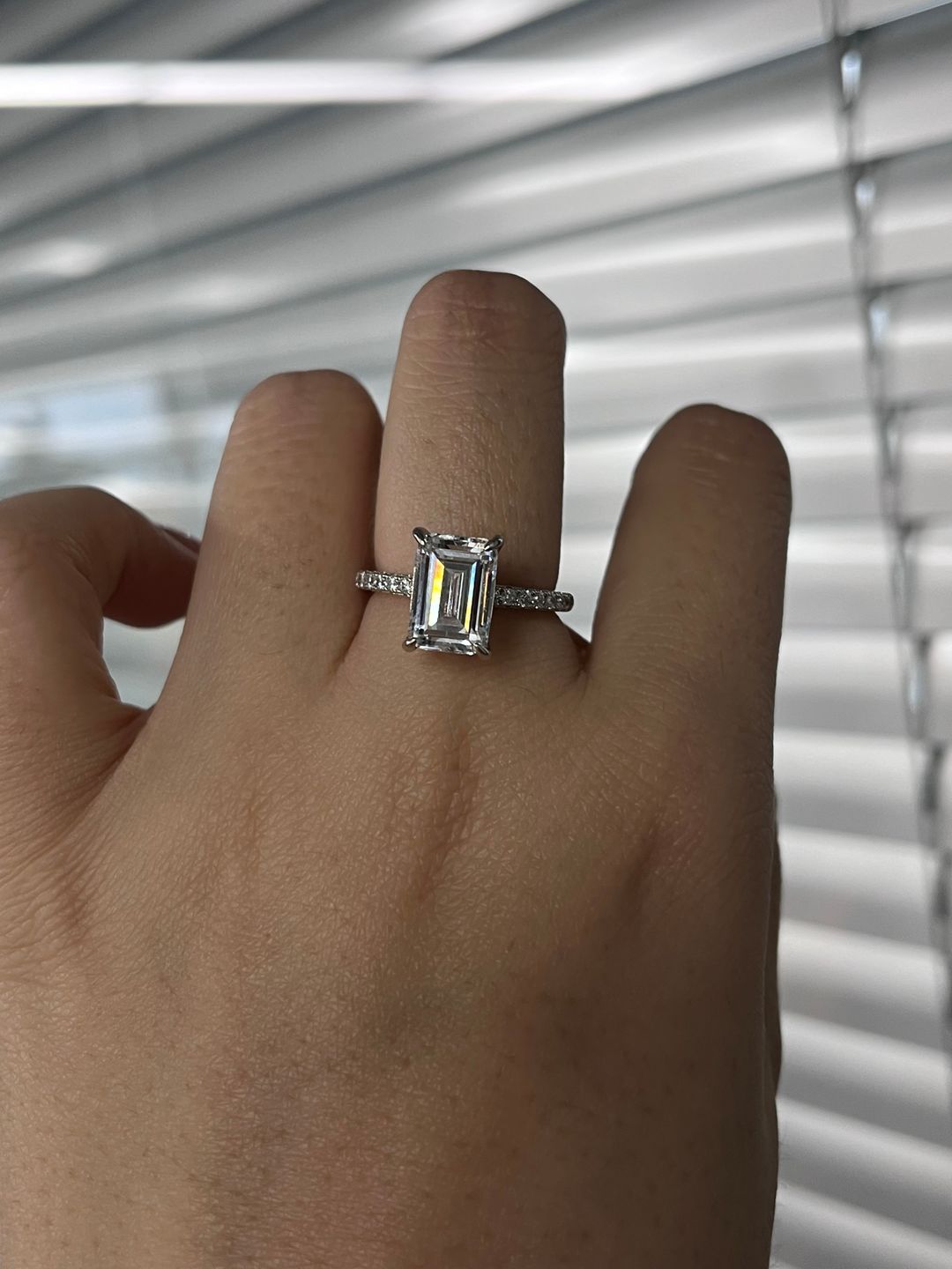 Customer photo review of Louily Classic Emerald Cut Engagement Ring In Sterling Silver