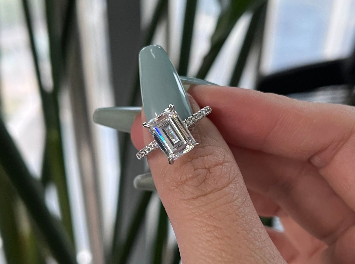 Customer photo review of Louily Classic Emerald Cut Engagement Ring In Sterling Silver