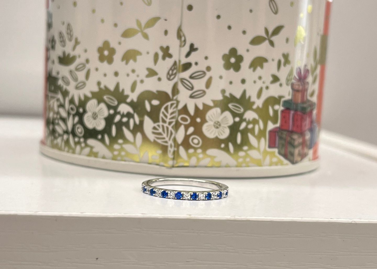 Customer photo review of Louily 0.3 CT Round Cut Half Eternity Blue And White Sapphire Wedding Band For Women In Sterling Silver