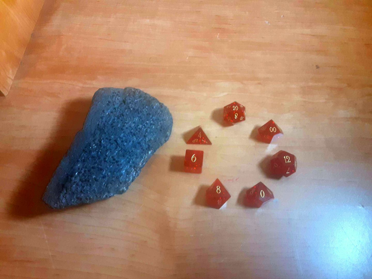 Customer photo review of URWizards D&D Garnet Glass Engraved Dice Set