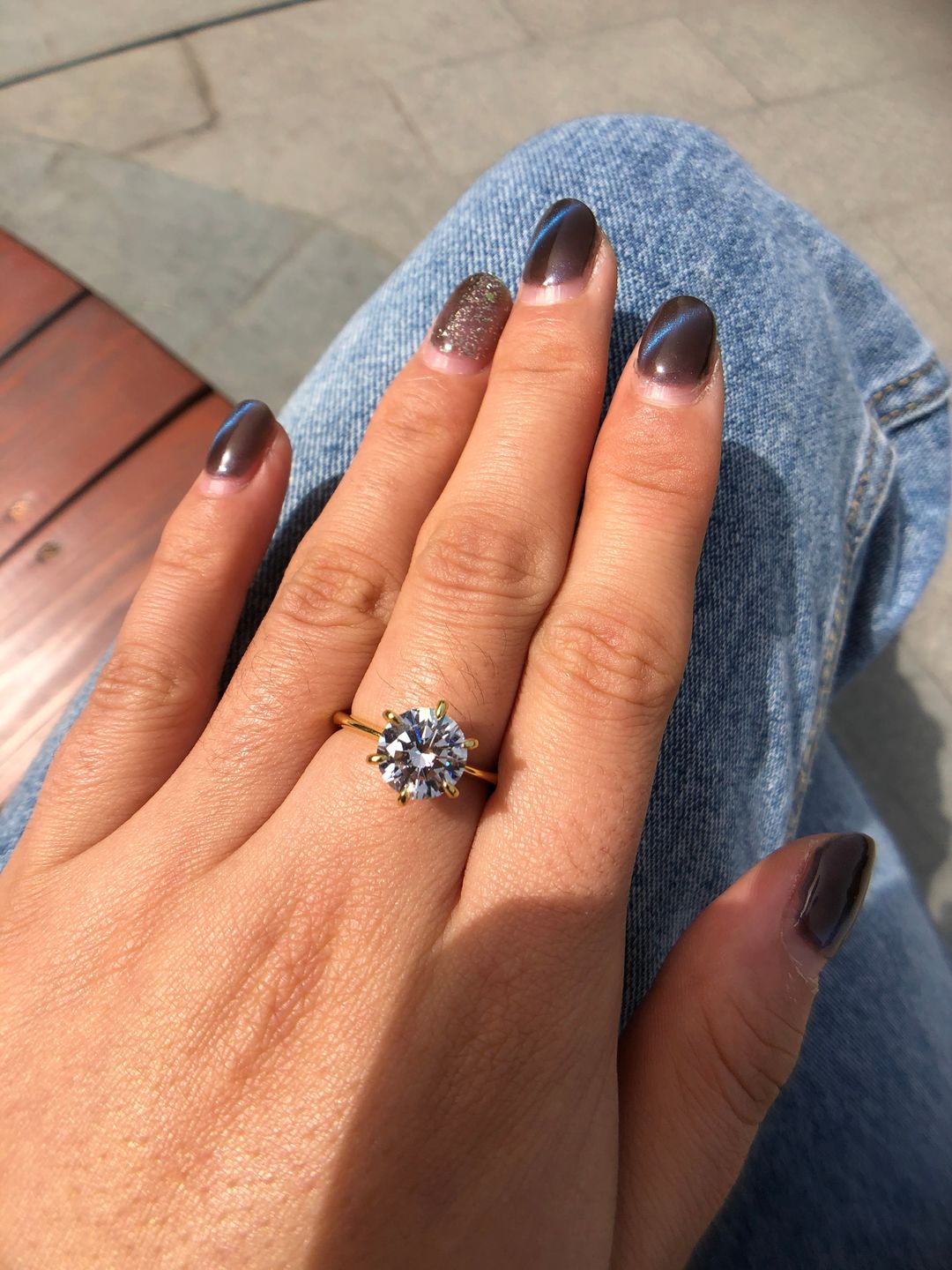 Customer photo review of S925 Moissanite/ Simulated Diamond 2.0 Carat Round Cut Solitaire Engagement Ring In Sterling Silver