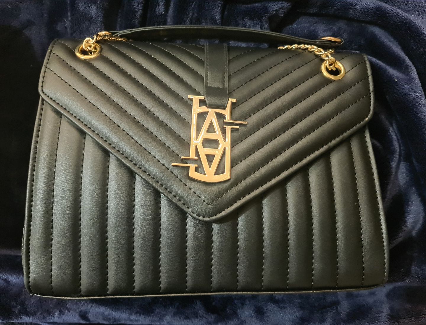 Customer photo review of MADRID LEATHER ENVELOPE BAG