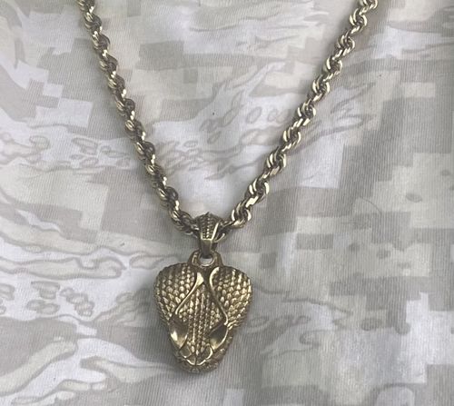 Customer photo review of Rattlesnake Clip Pendant