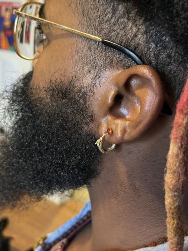 Customer photo review of Ouroboros Earrings