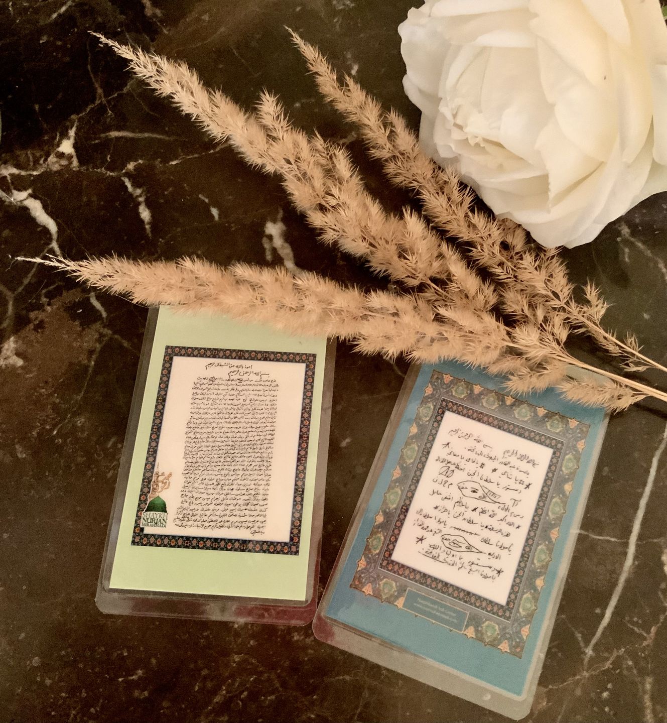 Customer photo review of Laminated Taweezes Pocket Wallet Small (1.5" x 2")