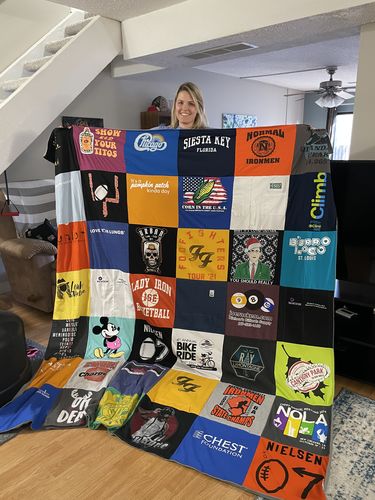 T-shirt quilt with travel, sports themes by Elizabeth from IL