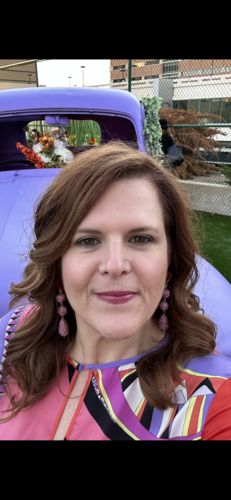 Customer photo review of DAHLIA OVERSIZED BOW CLIP-ON EARRINGS