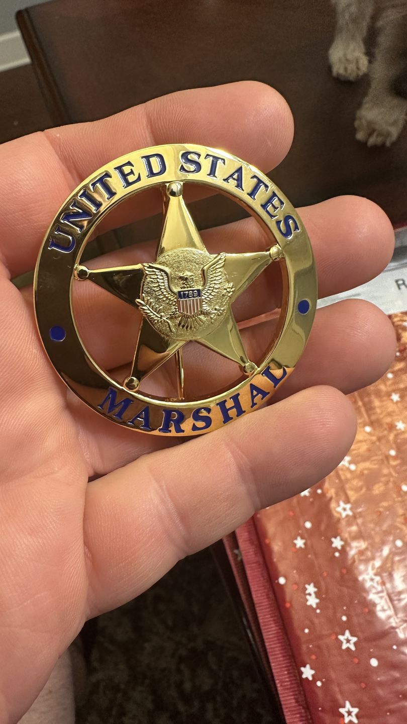 Customer photo review of US Federal Court Law Enforcement Marshal Gold Badge Replica Movie Props