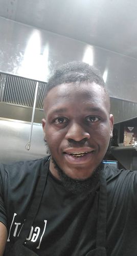 Customer photo review of Gold Diamond Cut Pattern Teeth Grillz