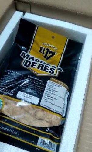 Reseña con foto de un cliente sobre Machaca de Res