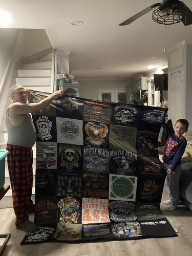 T-shirt quilt with traveling, fishing themes by Lori from NJ