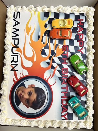 Customer photo review of Car Racing - Custom Edible Icing Image