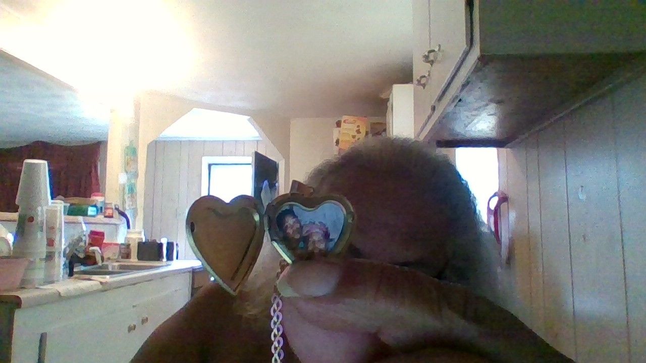 Customer photo review of Foldable Photo Frame Necklace Heart