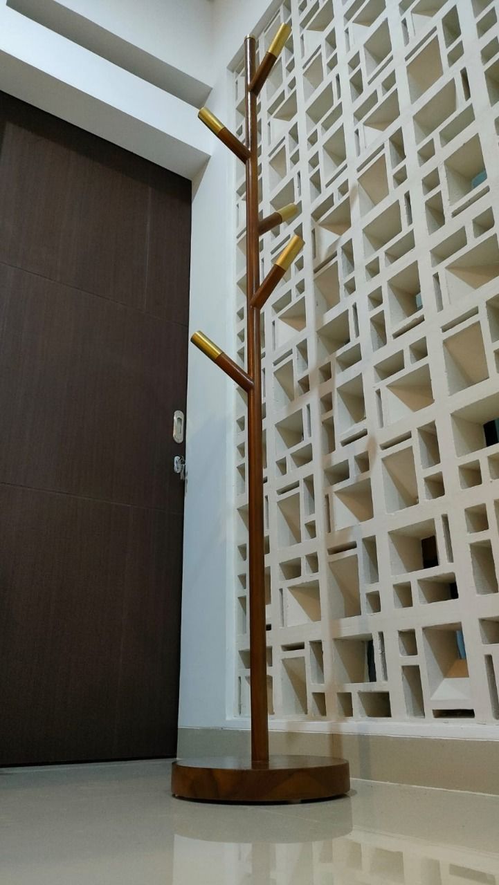 Customer photo review of Minimalist Teak Coat Rack – Branch Design