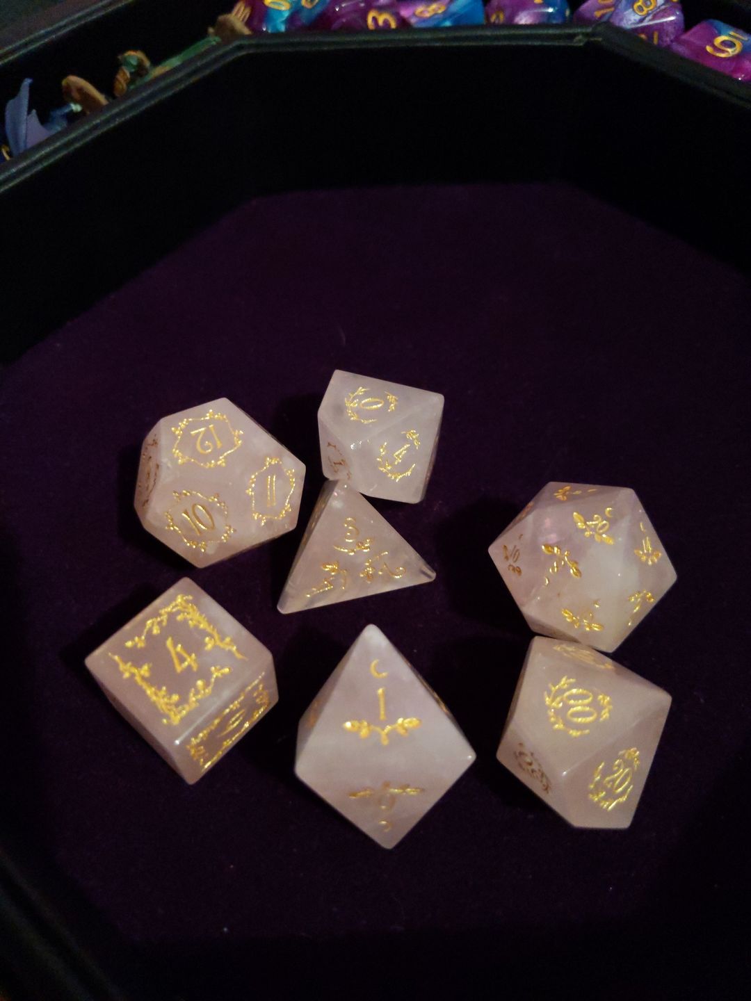 Customer photo review of URWizards D&D Rose Quartz Gemstone Engraved Dice Set Plant Vine Style