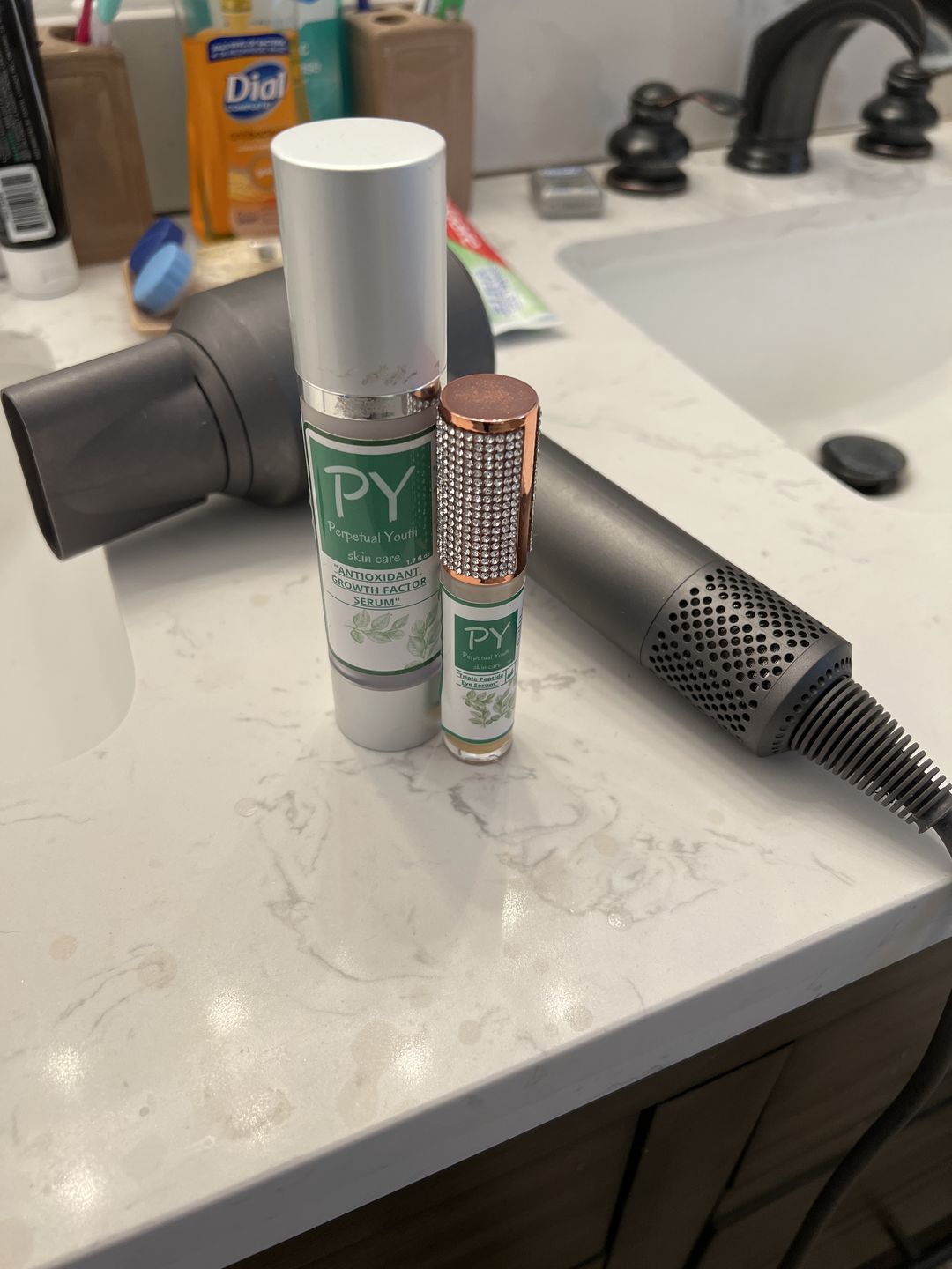 Customer photo review of BEST SELLER! BACK IN STOCK 🤩  Powerful Growth Factor Serum 1.7 oz. Covers all the ABCs of good skin care!