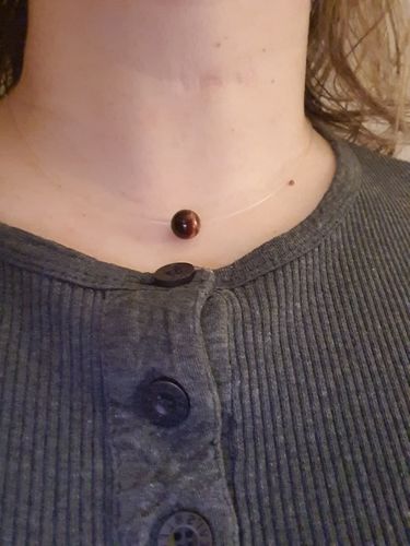 Customer photo review of Collier à perle d'oeil de taureau sur fil de nylon