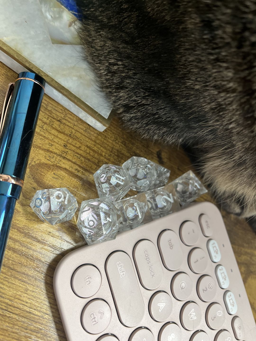Customer photo review of URWizards D&D Starry Liquid Heart Resin Engraved Dice Set Ice Cube