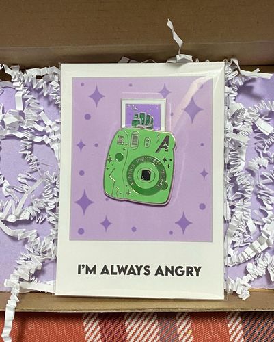 Customer photo review of Green Monster Polaroid Camera Pin
