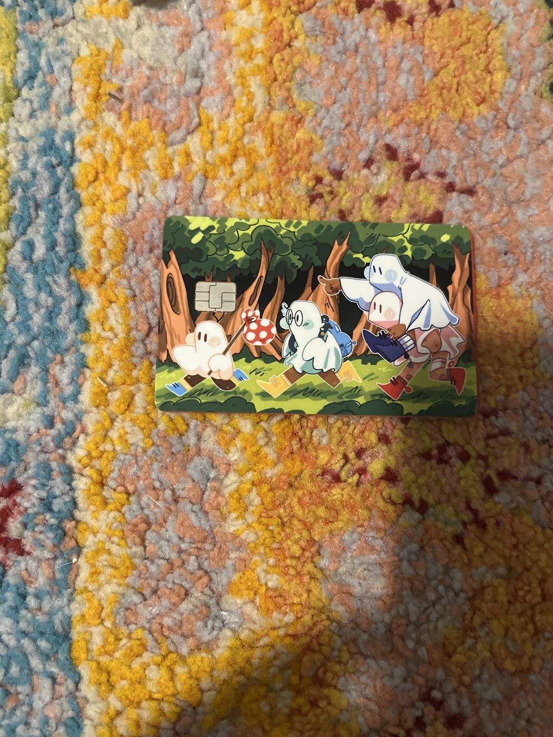 Customer photo review of Runaway Ghosts Credit Card Skins