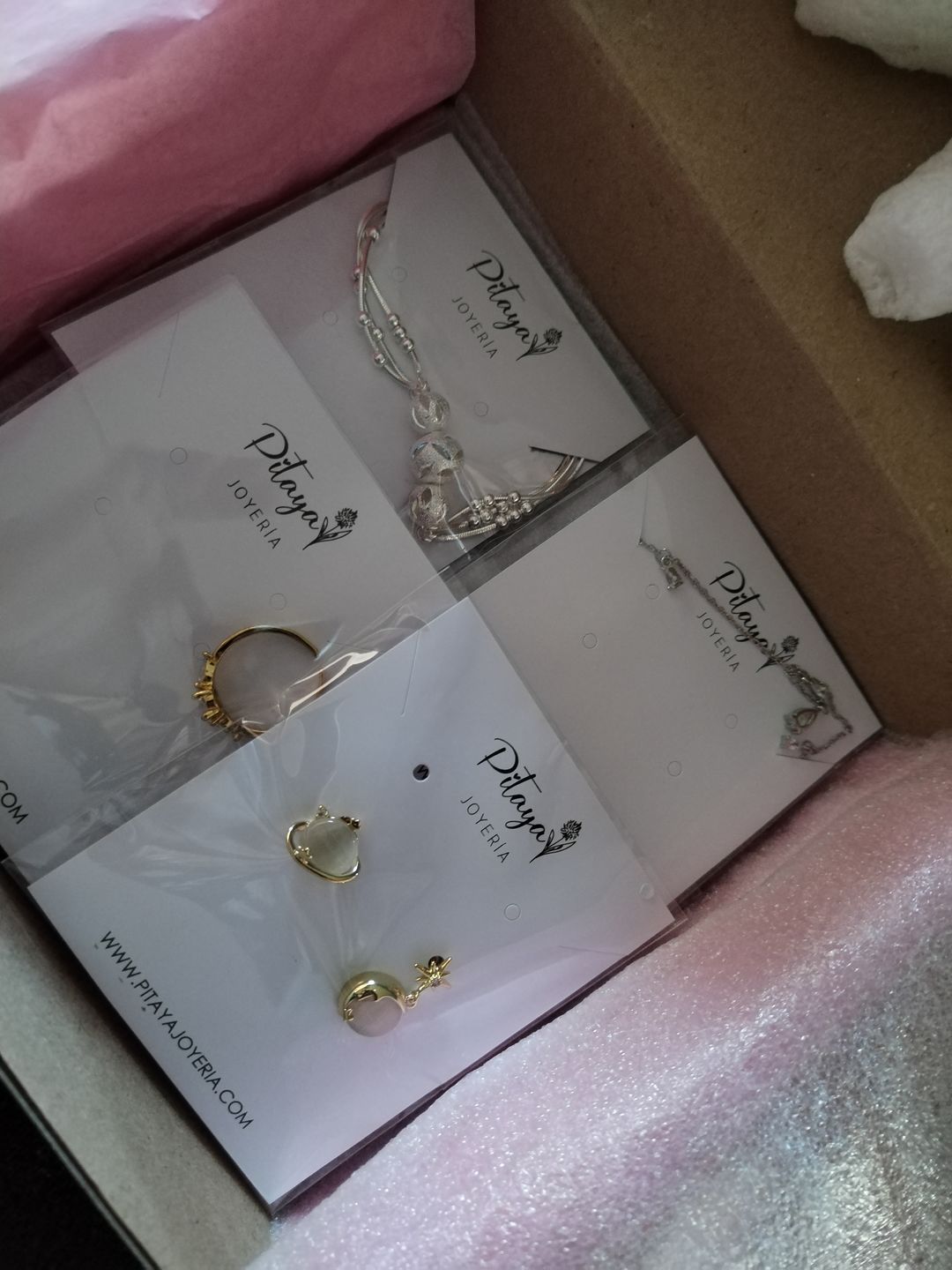 Customer photo review of Aretes de Saturno de Ópalo