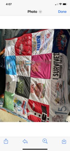 T-shirt quilt with running, sports themes by Mary from GA