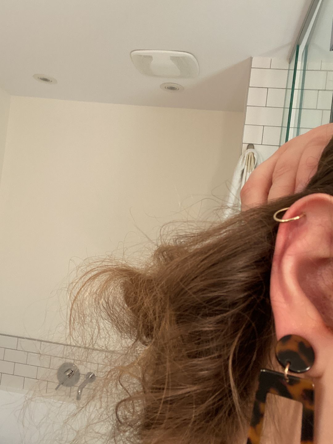 Customer photo review of Tiny Hoop Clip On Earrings in Gold
