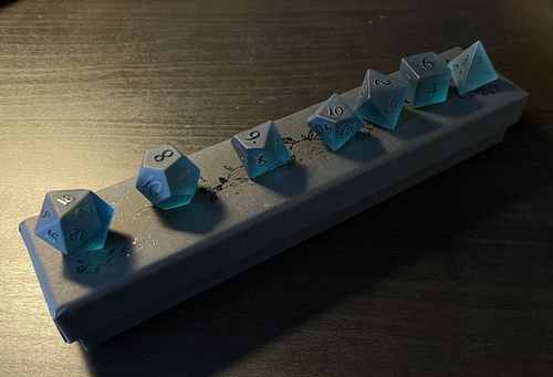 Customer photo review of Raised Dark Blue Glass DnD Dice Set All Number Dice