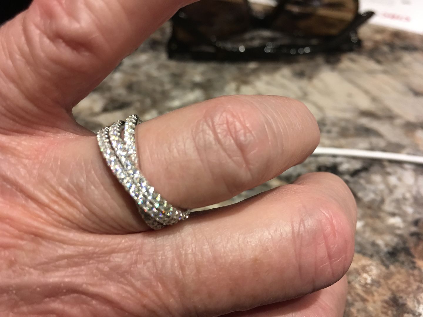 Customer photo review of Triple Criss-Cross Moissanite Pave Half Eternity Wedding Band Ring