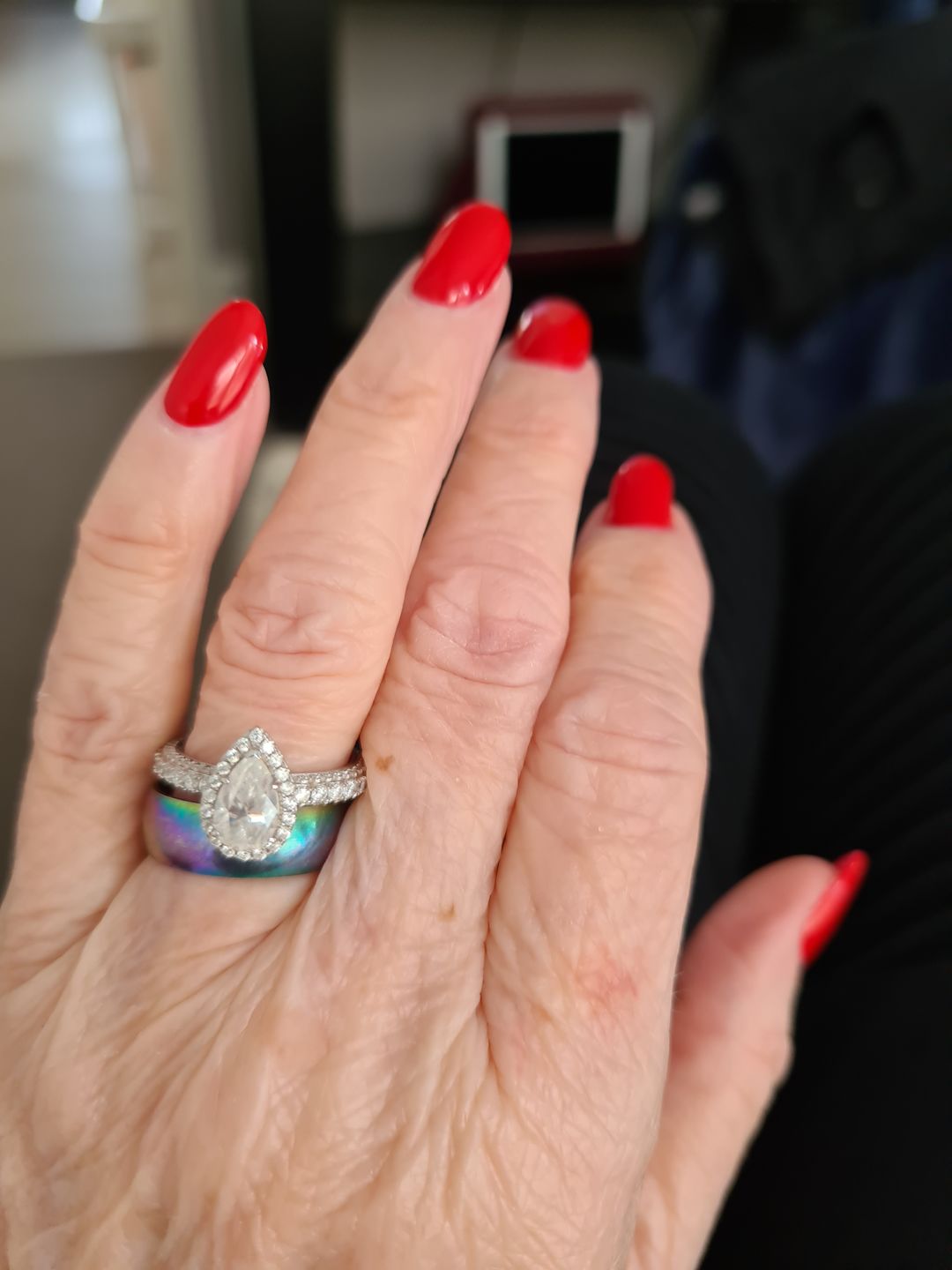 Customer photo review of Halo Pear Moissanite Triple Row Pave Engagement Ring
