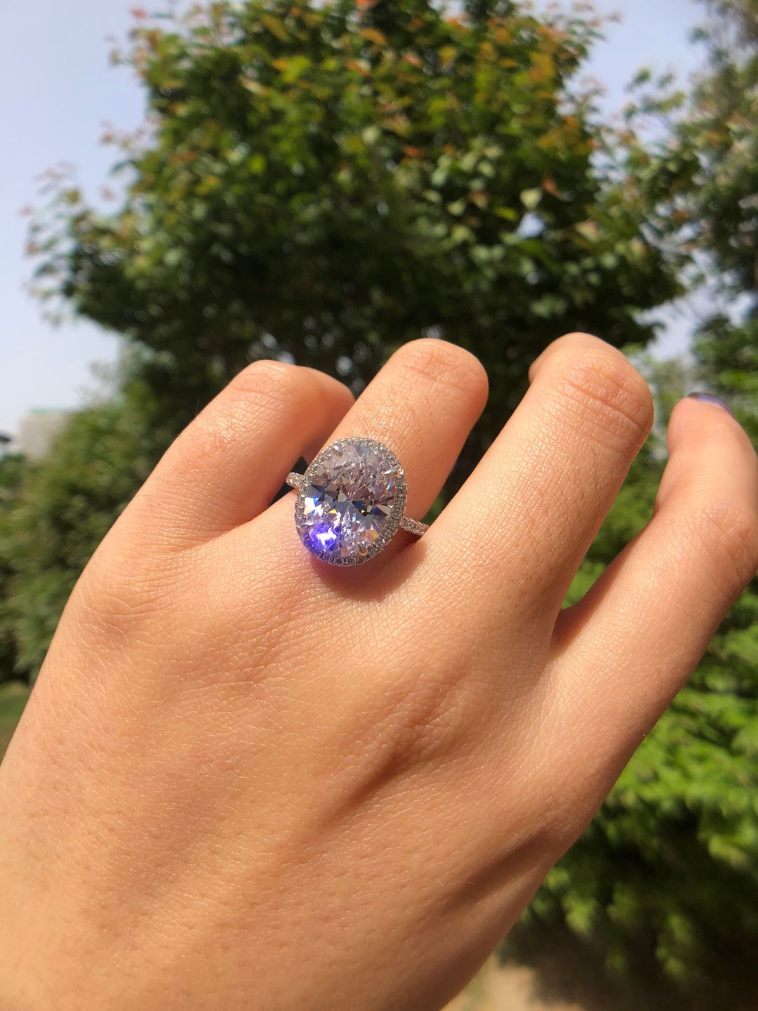 Customer photo review of Louily Halo 3.5Ct Oval Cut Simulated Diamond Engagement Ring In Sterling Silver