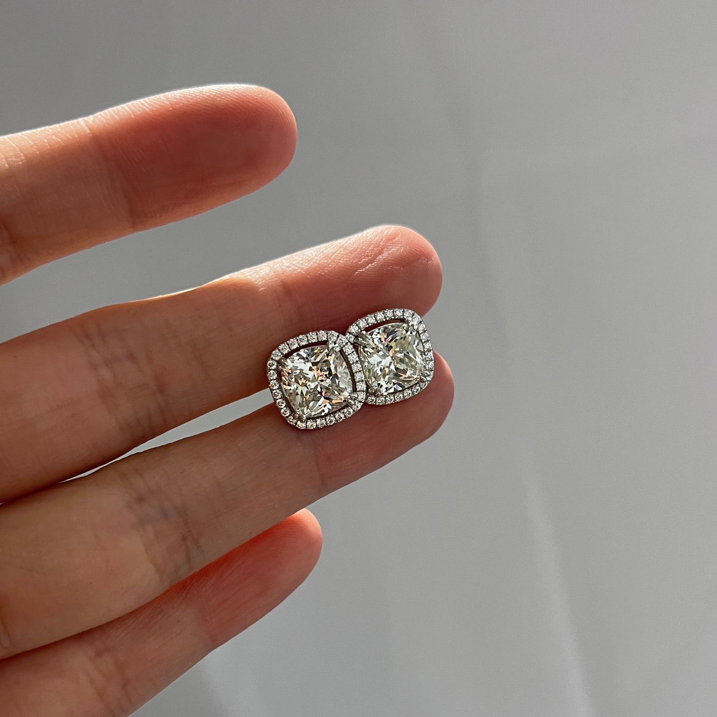 Customer photo review of Louily Sparkle Halo Cushion Cut Women's Stud Earrings In Sterling Silver
