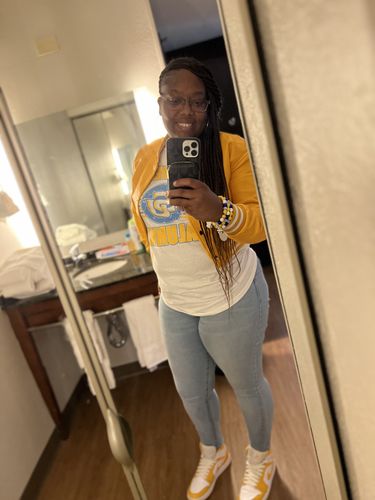 Customer photo review of Faux Leather Varsity Cropped Jacket (Mango)