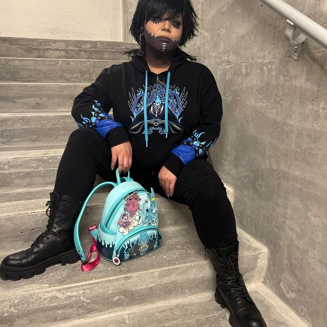 Customer photo review of Men Black Long Straight Fringe Bangs Layered Mullet Cosplay Wig
