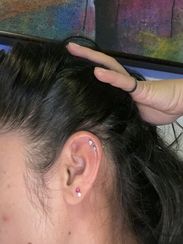 Customer photo review of Piercing de Estrella Titanio