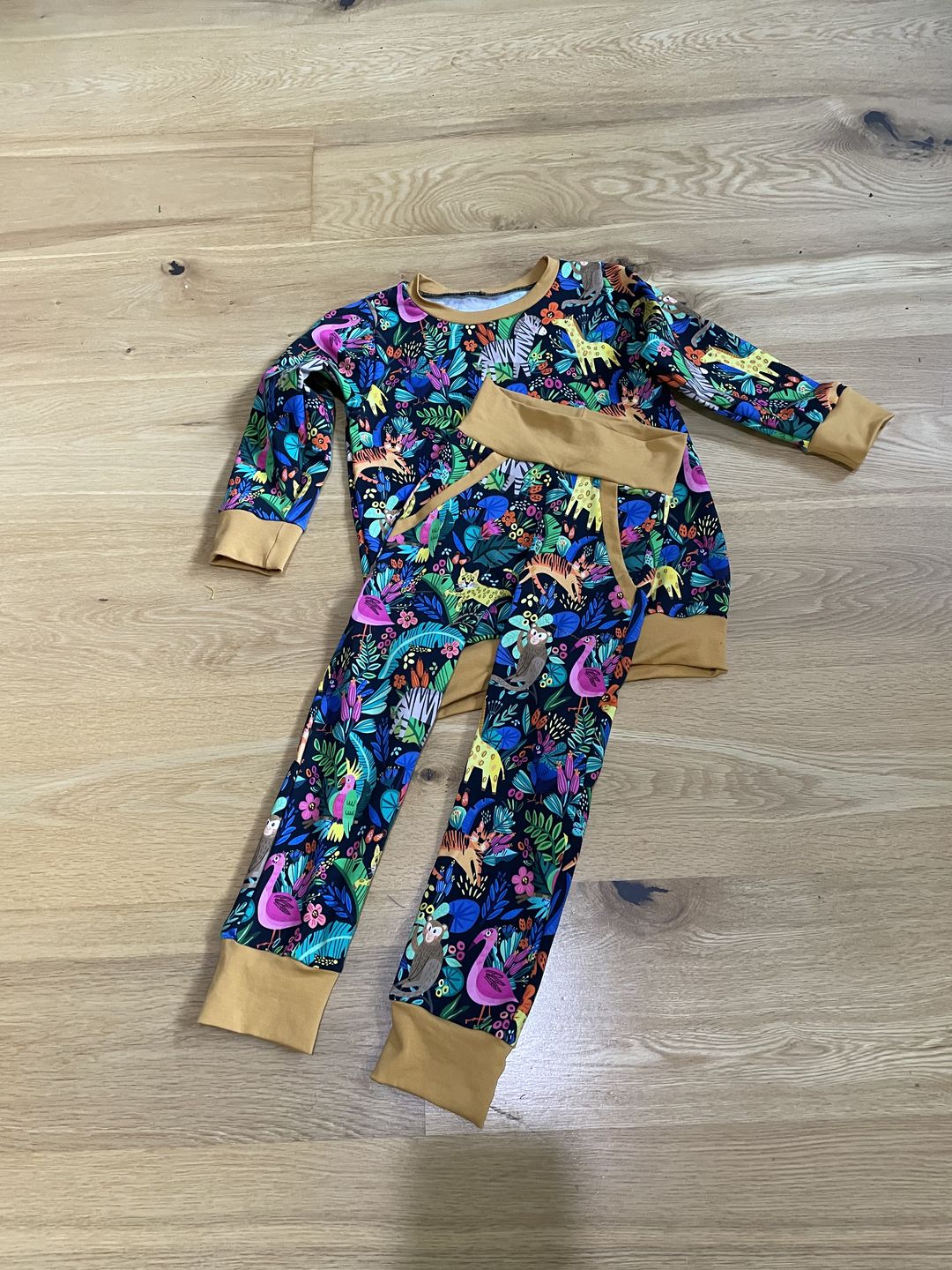 Customer photo review of Animal Jungle on Black French Terry Fabric