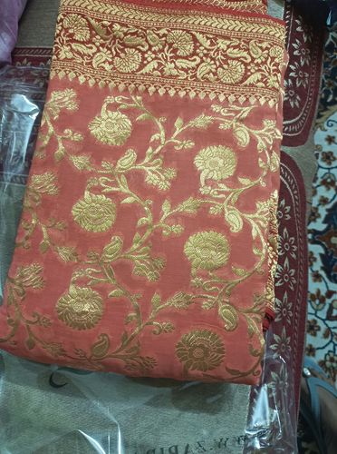 Customer photo review of Omya: Floral Khaddi Georgette Handloom Banarasi Saree in the Shades of Pink and Red
