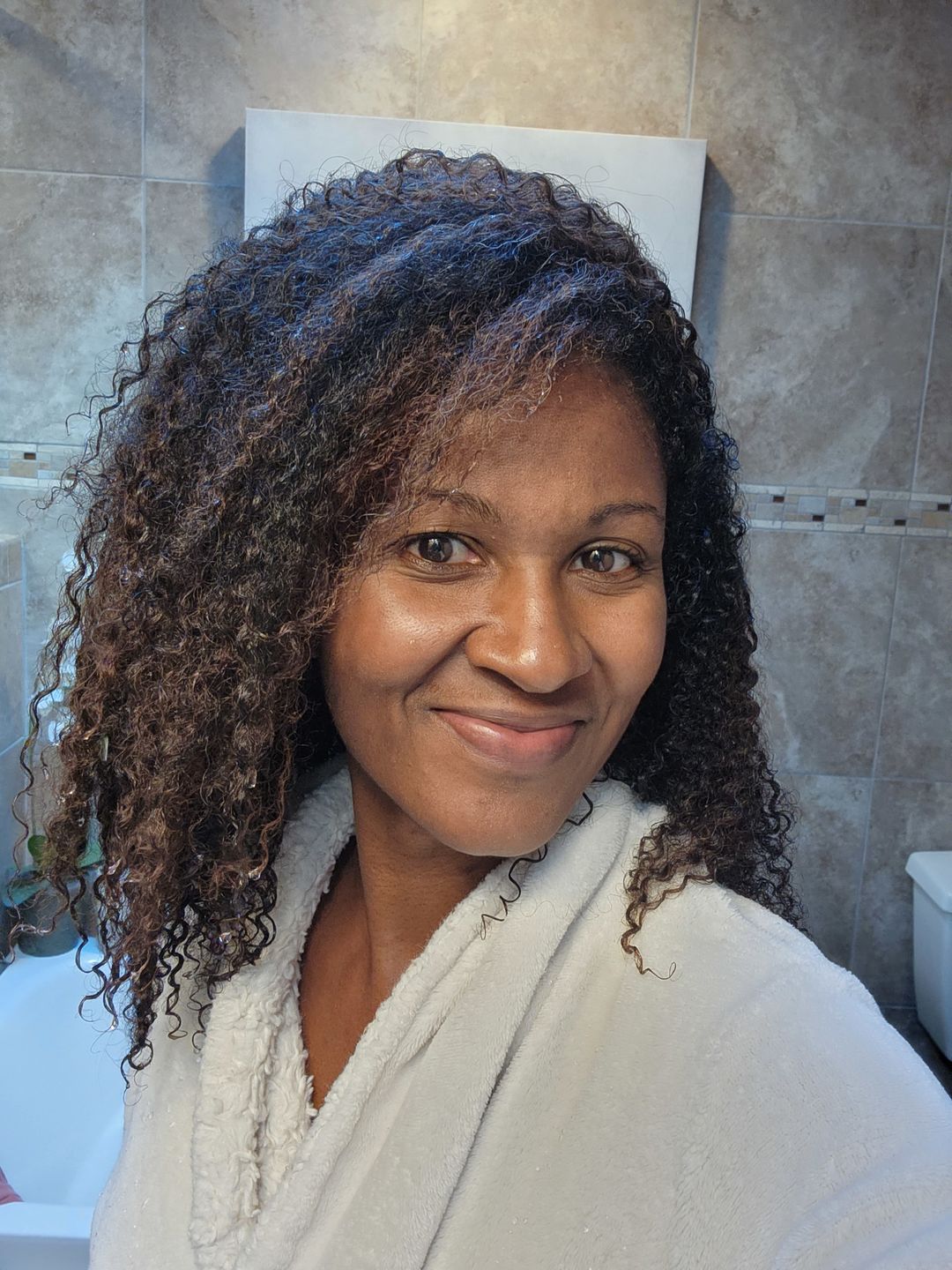 Customer photo review of Step 1: Moroccan Rhassoul 5-in-1 Clay Treatment (For Tight Curls)
