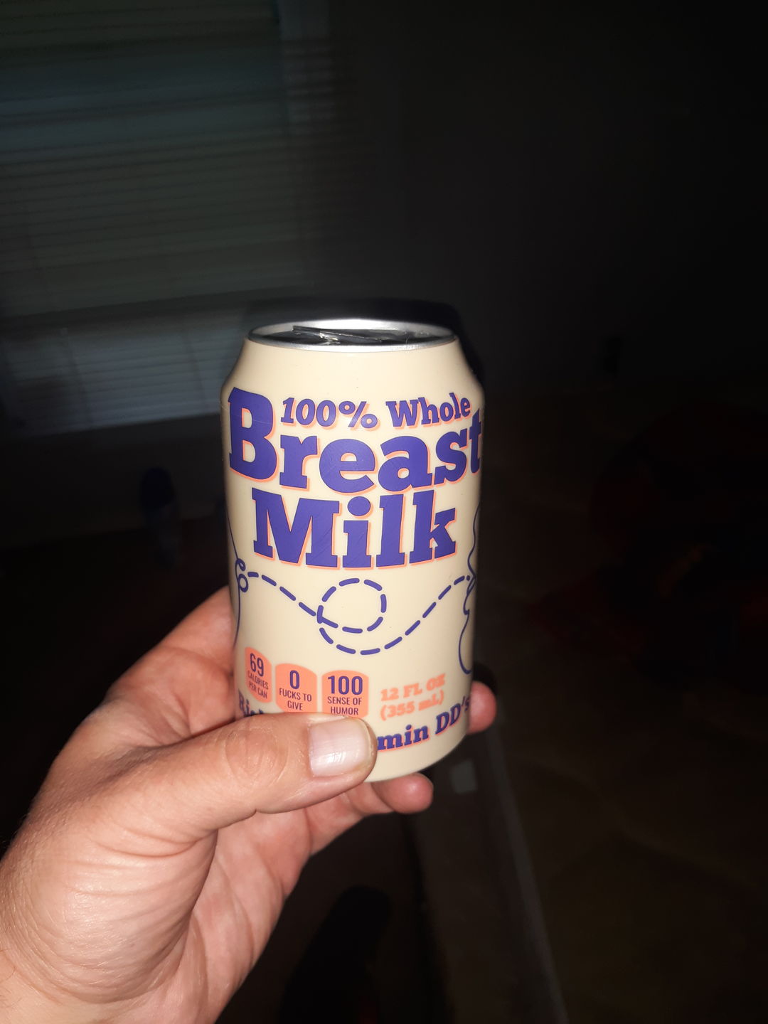 Customer photo review of "Breast Milk" Beersy Silicone Sleeve Hide-a-Beer Can Cooler