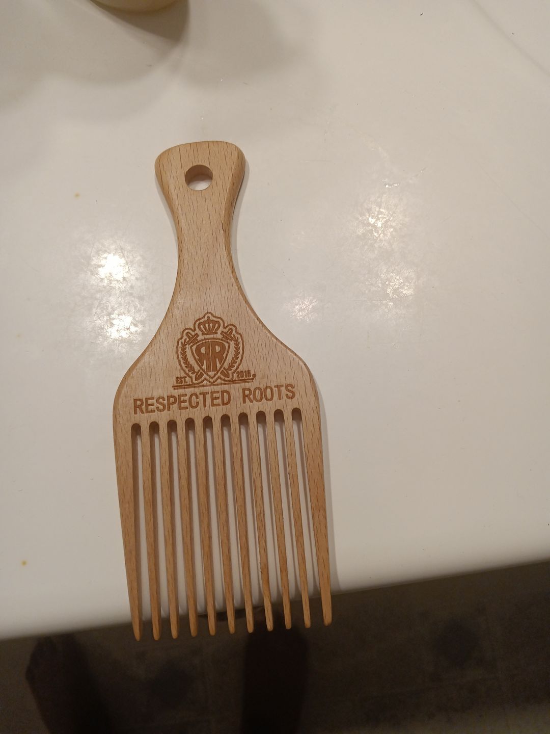 Customer photo review of Respected Roots Wooden Pick (or comb)