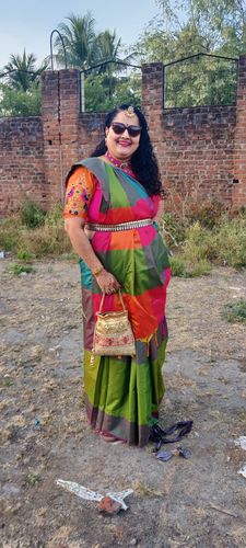 Customer photo review of Rubans Light Brown Coloured Potli Bag With Multicoloured Embroidery