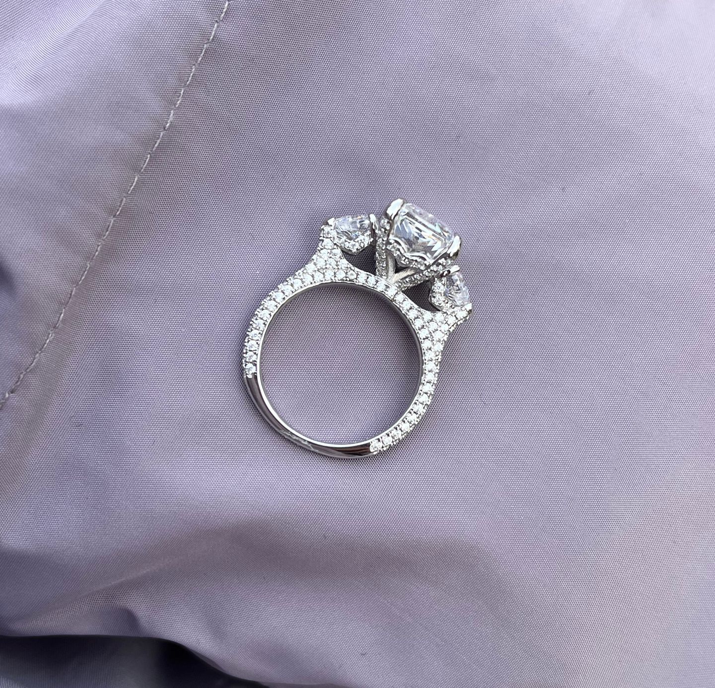 Customer photo review of Louily 5.0 Carat Radiant Cut Three Stone Engagement Ring With Two Heart Cut Side Stones