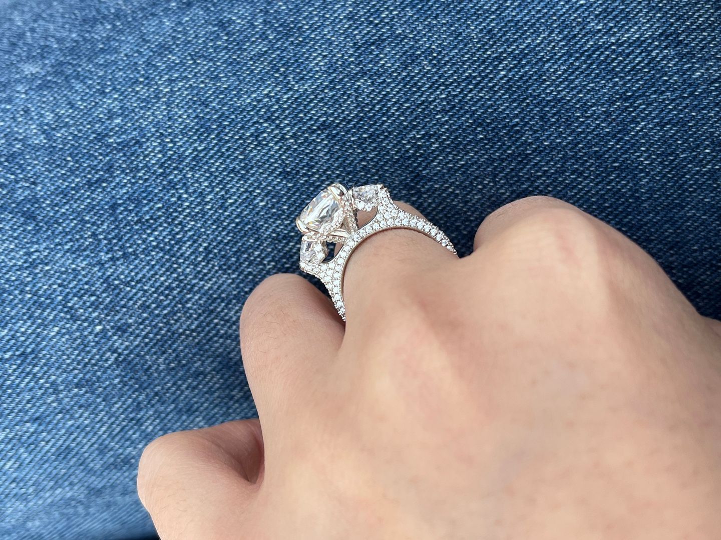 Customer photo review of Louily 5.0 Carat Radiant Cut Three Stone Engagement Ring With Two Heart Cut Side Stones