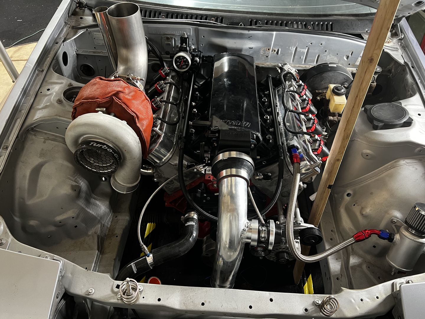 Customer photo review of Motion Raceworks Billet Valve Cover Breather / Oil Drain Billet (Single) 32-120-S