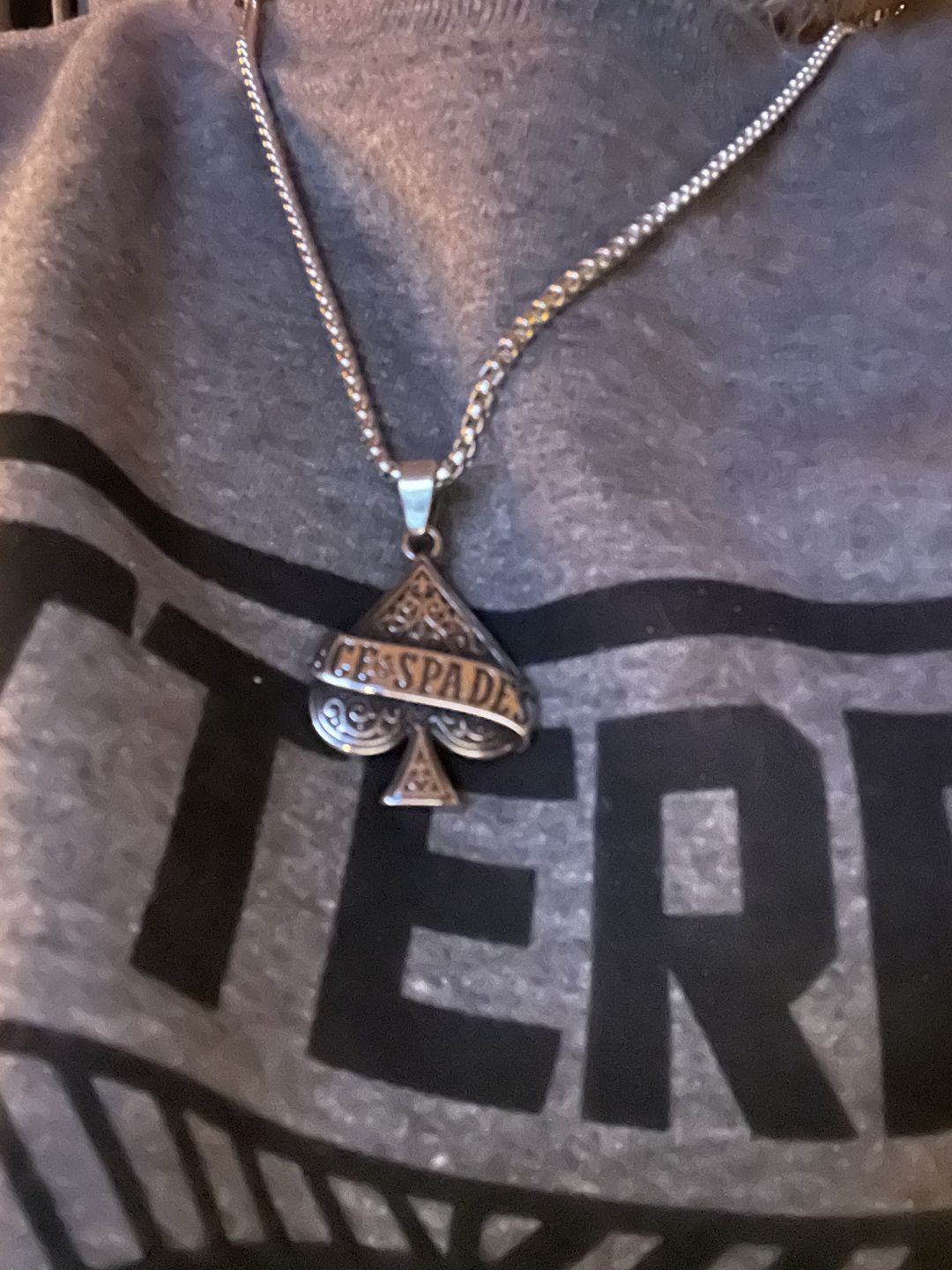 Customer photo review of ACE OF SPADES PENDANT.