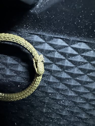 Customer photo review of Ouroboros Keychain
