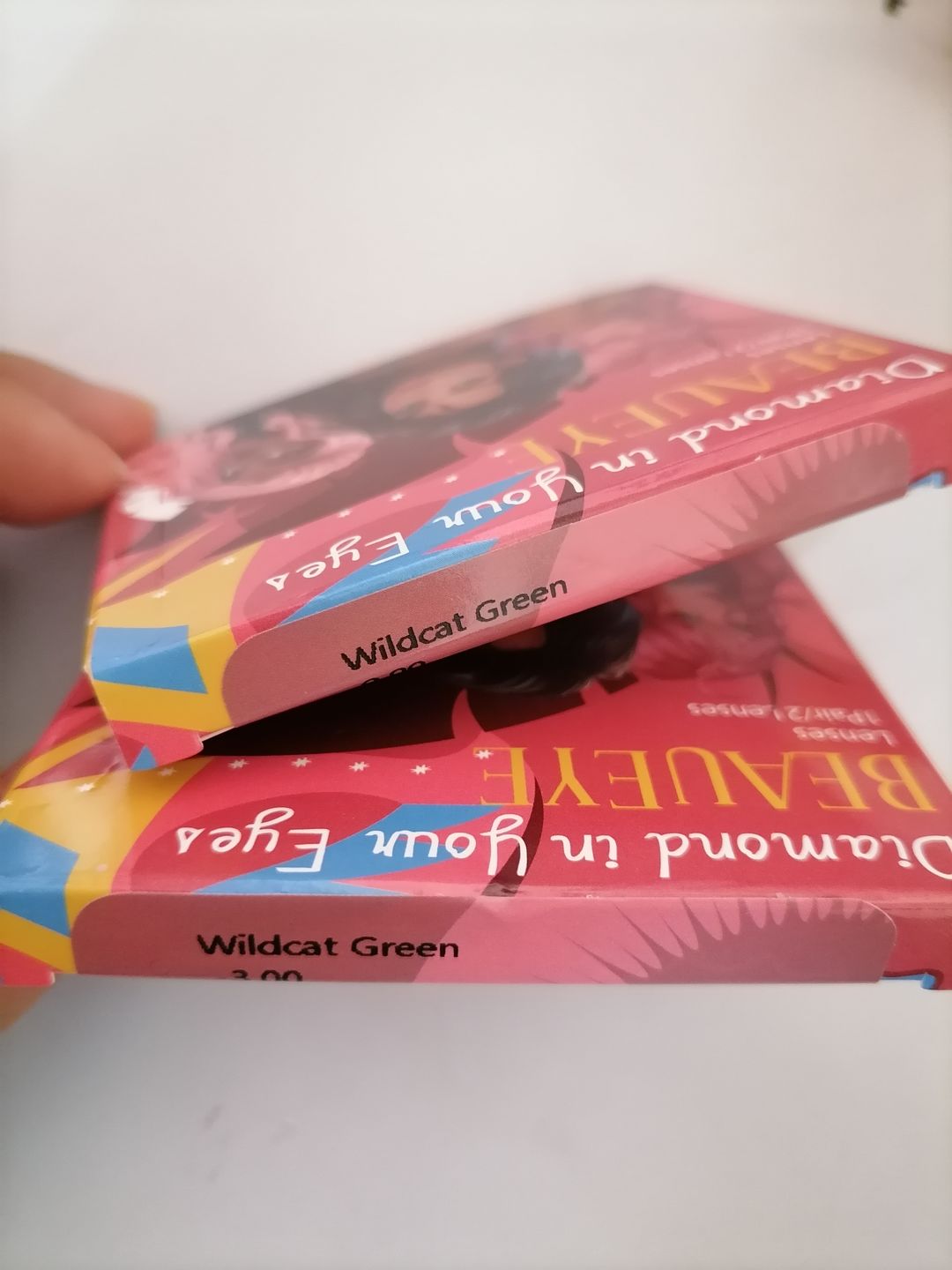 Customer photo review of Wildcat Green Prescription Colored Contact Lenses