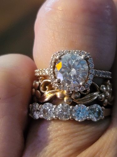 Customer photo review of Round Cut Moissanite Halo Ring in 10k Rose Gold